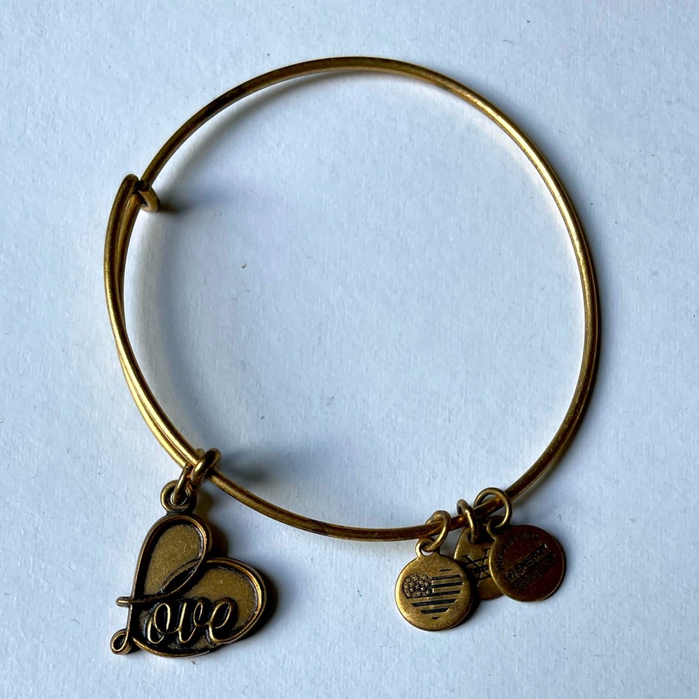 Bracelet, “LOVE” adjusting, beautiful design to fit all size.  NWOT